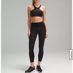 Lululemon set, Black with satin detail. Sz 6 bra, sz 4 leggings.